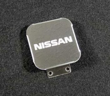 Заглушка на фаркоп с логотипом Nissan (на фаркопы TCC, нержавеющая сталь) TCC Nissan Murano 3 Z52 дорестайлинг (2015-2022)